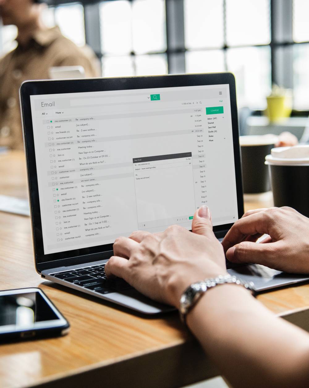 Woman typing into email webclient